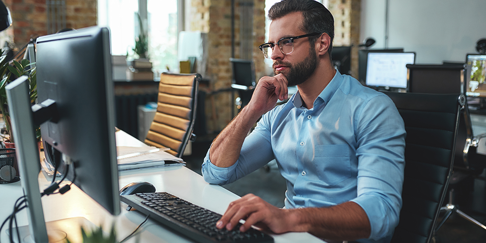 Employee watching microlearning video at work