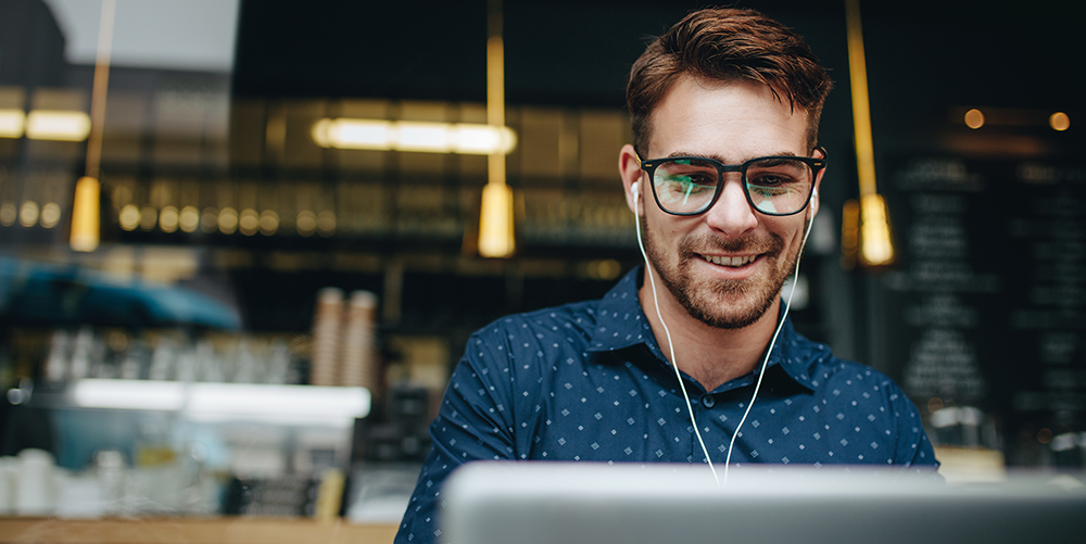 Man using computer for self-directed learning