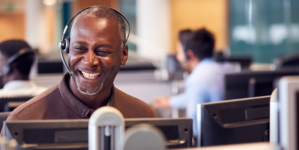 customer service employee calling a happy loyal customer