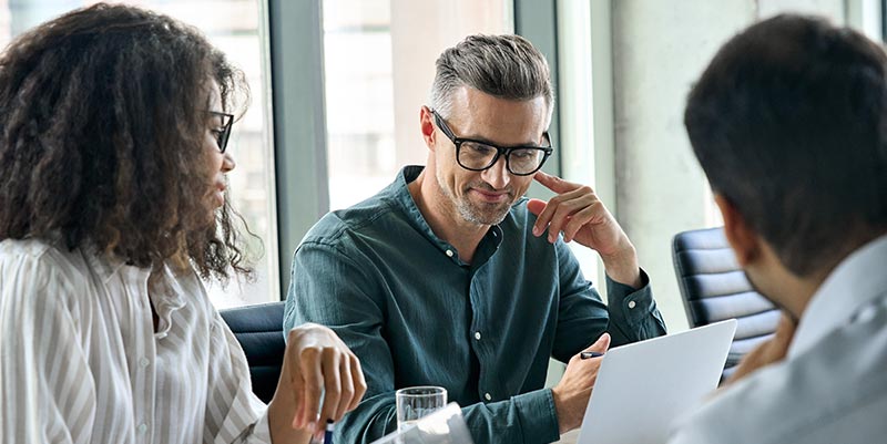 executives reviewing online learning technology pricing options